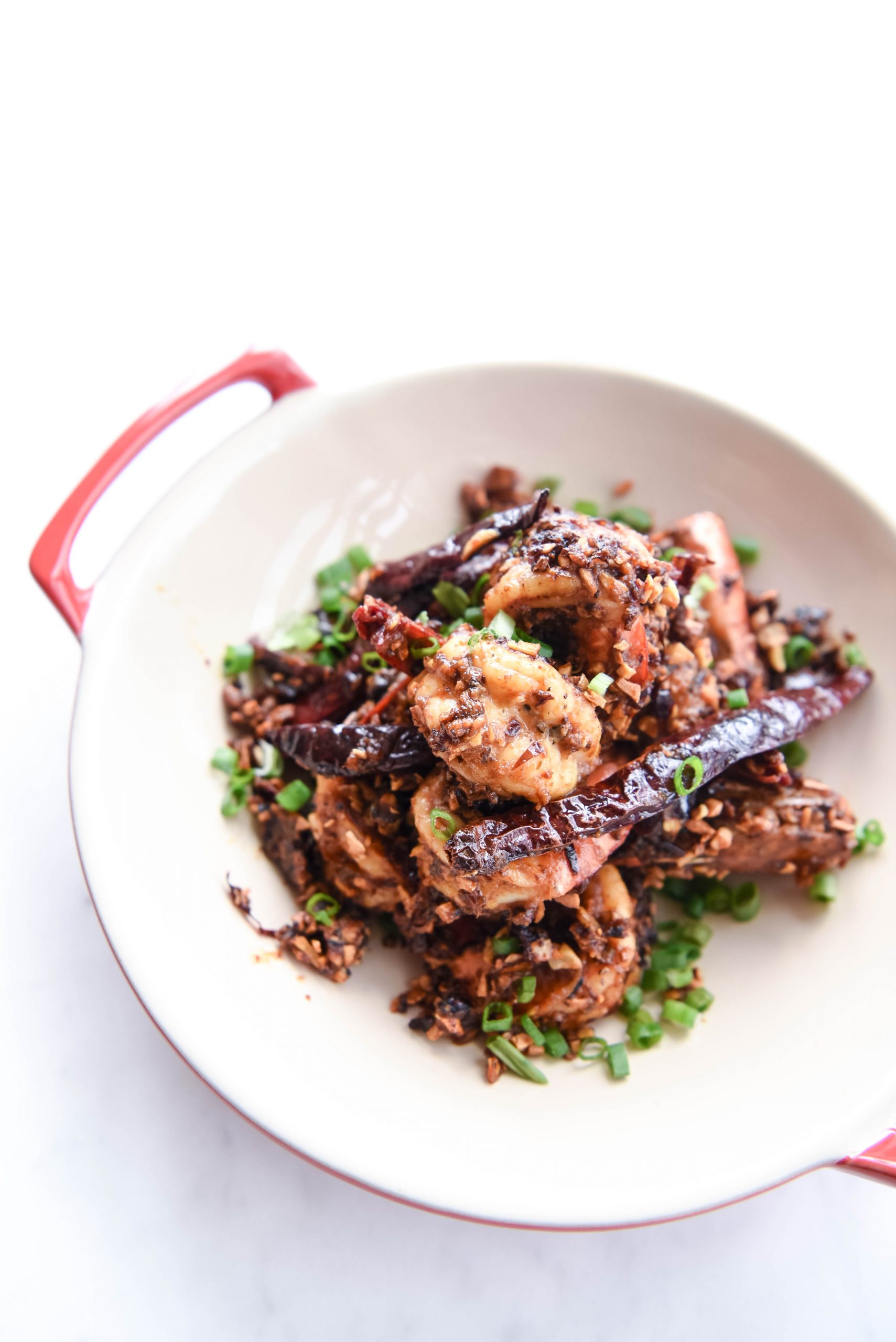 Miso Garlic Prawns in a red white plate